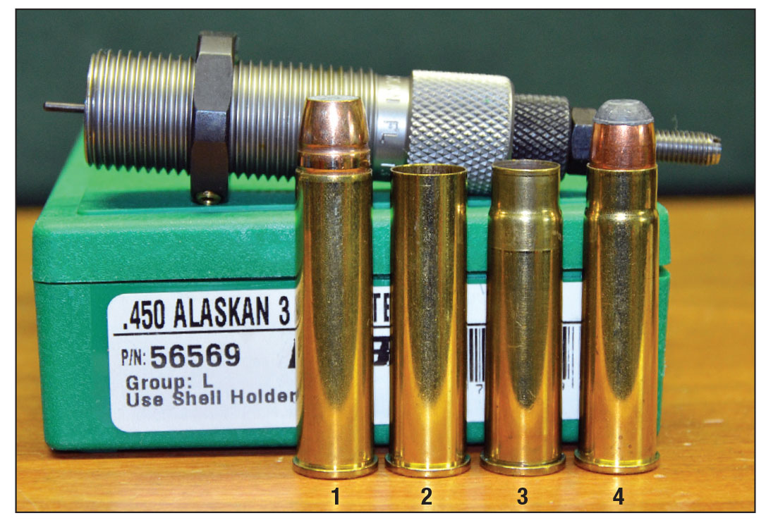An RCBS full-length resizing die is used to neck down the Starline 50 Alaskan case for .458-inch bullets. No fireforming is required. (1) Loaded 50 Alaskan cartridge, (2) 50 Alaskan case, (3) 50 Alaskan case necked-down and (4) Loaded 450  Alaskan cartridge.